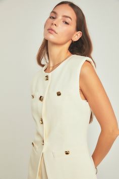 Introducing our must-have Linen Power Shoulder Vest the perfect addition to any wardrobe. Made with 100% linen this versatile top is ideal for any occasion. Its round neckline and sleeveless design offer a flattering fit while the shoulder pads add a touch of structure for a bold and sophisticated look. This top is the ultimate blend of style and comfort making it a must-have for every fashion-forward woman. Upgrade your wardrobe with our Linen Power Shoulder Vest today and make a statement! Sophisticated Look, Sequin Fabric, Winter Sale, Denim Pants, Shoulder Pads, Round Neckline, Workout Clothes, Must Haves, Fashion Forward