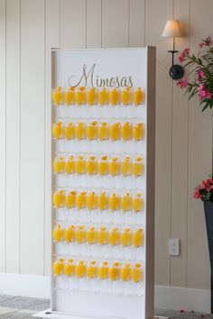 a white and yellow display with candles on it