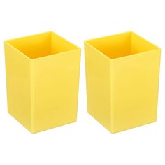 two yellow square vases sitting next to each other