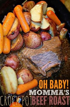 a crock pot roast with carrots, potatoes and meat in it is ready to be eaten