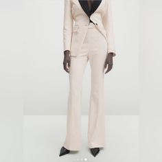 Massimo Dutti Product Info On-Trend Trousers With A Flattering Design That Combines Elegance And Comfort. Elegant Stretch Pantsuit For Spring, Chic Fitted Ankle-length Pantsuit, Tailored Structured Formal Bottoms, Spring Structured Formal Bottoms, Structured Bottoms For Formal Spring Occasions, Elegant Structured Fitted Pants, Chic Fitted Dress Trousers, Chic Fitted Dress Pants, Elegant Fitted Dress Pants For Spring