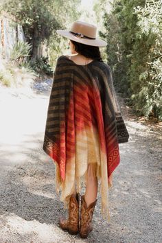 Introducing the most gorgeous Bohemian Style Color Blend Tassel Serape! This beautiful piece is perfect for adding a touch of boho-chic to any outfit. The serape is made from a soft and lightweight fabric, making it perfect for summer days or layering up in winter. It features a colorful tassel design that is sure to add a pop of color to any outfit. Whether you're wearing it as a scarf, shawl, or sarong, this piece is sure to turn heads! #lovemyleto 100% Polyester Imported Bohemian Spring Poncho With Tassels, Bohemian Fringe Shawl For Spring, Serape Kimono, Bohemian Multicolor One-size Wraps, Red Bohemian Shawl With Fringe, Casual Bodysuit, Bachelorette Dress, Rush Dresses, Bridal Shower Dress