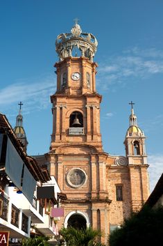 an old building with a clock tower on top