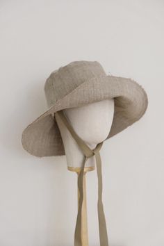 Handcrafted in Adelaide, South Australia. This cotton wide brim hat offers exceptional breathability and comfort, making it a perfect choice for sunny days. Crafted with love and care, this versatile hat is designed to not only enhance your look but also provide essential sun protection. Please allow 1-2 weeks turnaround time for all made to order items. * Linen * Cotton Lining * Raw edged Size guide: Adult S fits head circumference 55 -57cm Adult M fits head circumference 57 -59cm Adult L fits Beige Curved Brim Straw Hat For Outdoor Use, Beige Wide Brim Panama Hat For Outdoor, Lightweight Beige Panama Hat For Outdoor, Lightweight Adjustable Fit Summer Bucket Hat, Summer Lightweight Adjustable Bucket Hat, Eco-friendly Fedora Sun Hat For Summer, Eco-friendly Bucket Hat For Spring Vacation, Spring Vacation Bucket Hat With Adjustable Fit, Natural Upf 50+ Bucket Sun Hat