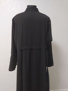 PAY ATTENTION! We have no items of clothing on stock. Production time will take 2-4 weeks (depending on the workload). Please allow about 2-4 weeks to complete your order. I hope for your understanding. Winter cassock made of wool - Black cassock in wool - Warm orthodox ondercassock - Winter innercassock Material: wool. This cassock is created in line with the Orthodox tradition. If you need to make personal changes to cassocks design, contact me before purchase. The measurements I will need: 1. Black Long Formal Thobe, Formal Black Long Thobe, Formal Long Black Thobe, Black Long Sleeve Robe For Fall, Michigan Summer, Russian Fashion, Shirt Collar, Pay Attention, Ukraine