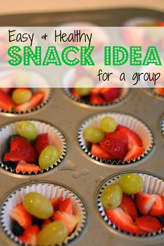 cupcakes filled with fresh fruit sitting in a muffin tin