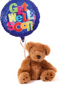 a brown teddy bear sitting next to a blue balloon with the words get well soon on it