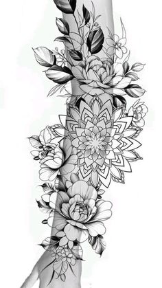 a black and white drawing of a leg with flowers on the bottom half of it