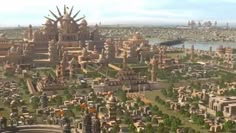 an aerial view of a city with lots of tall buildings and large statues on it