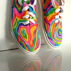 Custom hand painted Funky Festival Rainbow shoes. These colorful rainbow sneakers will be perfect for rave and disco music festival. Acrylic paint on canvas shoes. Every size is possible. I use US size chart!  Shoes are hand painted using High grade acrylic paint. I use a special textile paint designed to be flexible on fabric. The paint is water proof and fade proof.  Prices depends on what model of shoes you will choose LET ME KNOW IF YOU NEED YOUR ORDER ASAP OR FOR A SPECIFIC DATE  SIZE Pleas Festival Shoes Comfortable, Colorful Fun Sneakers For Summer, Artistic Multicolor Sneakers For Summer, Fun Multicolor Hand Painted Sneakers, Hand Painted Multicolor Fun Sneakers, Artistic Multicolor Summer Sneakers, Fun Rainbow Sneakers For Spring, Artsy Hand Painted Multicolor Sneakers, Artistic Multicolor Spring Sneakers