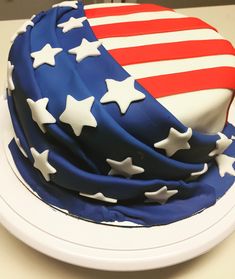 an american flag cake on a white plate