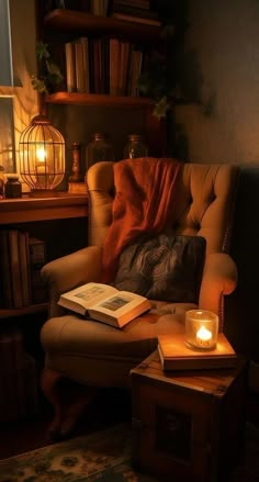 a chair with a book on it and a lit candle in the corner next to it