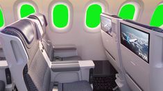 the inside of an airplane with green windows