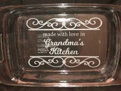 a glass dish with the words made with love in grandma's kitchen