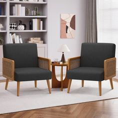 two chairs sitting next to each other in a living room