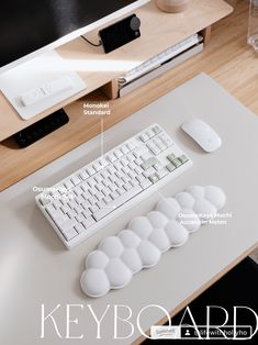 a keyboard and mouse sitting on top of a desk