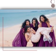 four women in purple dresses are posing on the beach with their arms around each other