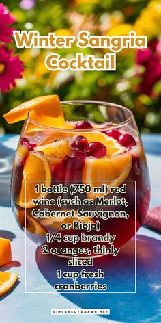 an advertisement for winter sangria cocktail with oranges and cranberries