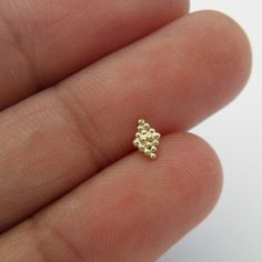 "Unique Tiny Rhombus Nose Stud, 14K Solid Yellow Gold Nose Screw, Ear Piercing- fits a variety of piercing locations. The tiny stud is made of the finest 14k solid gold, lightweight, comfortable and easy to wear. Though small, this delicate stud piercing will add a subtle twinkle of light to any casual everyday outfit, and a bohemian style to any evening elegant dress. Upgrade your jewelry collection with this brilliant handcrafted piece of art or get it as a high-quality special gift for your l Dainty 14k Gold Diamond-shaped Jewelry, Dainty Yellow Gold Diamond-shaped Jewelry, 14k Gold Diamond-shaped Ring, Indian Nose Pin, Nose Piercing Gold, Piercing Locations, Nose Ring Gold, Gold Nose Ring, Stud Piercing