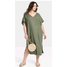 Relaxed Oversized Linen Dress New Spring Casual Maxi Dress With Batwing Sleeve, Casual Spring Maxi Dress With Batwing Sleeves, Casual Oversized Beach Midi Dress, Casual Oversized Midi Dress For Beach, Oversized Short Sleeve Midi Dress For The Beach, Casual Batwing Sleeve Beach Dress, Casual Summer Dresses With Batwing Sleeves, Oversized V-neck Midi Dress For Beach, Sleeveless Dress Casual