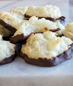 chocolate covered cookies with white crumbs on top