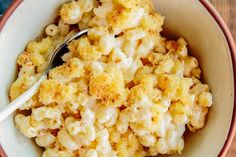 a white bowl filled with macaroni and cheese