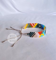 the bracelet is made with multicolored beads