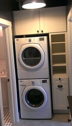 a washer and dryer in a small room