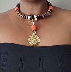 100% handcrafted using African beads. The necklace makes a perfect gift to loved ones. It will make you look bold and beautiful. **Buy multiple items and pay shipping for 1 item only.The rest ships free. More neckleces here; https://www.etsy.com/shop/TribalTess?ref=seller-platform-mcnav&section_id=21306083 Back to my shop; https://www.etsy.com/shop/TribalTess?ref=seller-platform-mcnav African Trade Bead Jewelry, African Beaded Necklace, Leather Beaded Necklace, African Inspired Jewelry, African Jewellery, Large Bead Necklace, Artsy Jewelry, African Beads Necklace, Fancy Jewelry Necklace