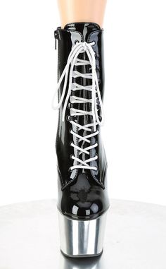 7" (178mm) heel, 2 3/4" (70mm) platform lace-up ankle boot featuring chrome plated platform bottom in silver and inside zip closureHEEL/PLATFORM : 7" Heel, 2 3/4" PFFIT GUIDE : True to sizeVEGAN : Yes SIZE: US women's sizing High Heel Patent Leather Lace-up Boots With Platform, Emo Boots, Vegan Heels, Pleaser Heels, Demonia Shoes, Pink Platforms, Pleaser Shoes, Silver Chrome, Lace Up Ankle Boots