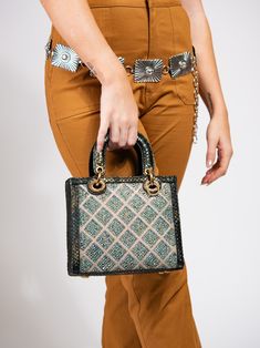 The Callista Grid Pattern Rhinestone Snakeskin Convertible Bag is a must-have for any fashion forward individual. With its unique grid pattern and luxurious snakeskin material, this bag will elevate any outfit. Complete with stunning rhinestone accents, it can be worn as a shoulder bag or converted into a stylish crossbody. Perfect for day or night, this bag is versatile and statement-making. SizeHEIGHT: 9.5"WIDTH: 7.5"DEPTH: 4" QualityMade with premium materials for quality and endurance Import Chic Snake Print Rectangular Shoulder Bag, Chic Rectangular Snake Print Shoulder Bag, Chic Rectangular Shoulder Bag With Snake Print, Chic Rectangular Snake Print Bag, Convertible Bags, Grid Pattern, Snake Skin, Convertible, Fashion Forward