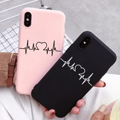 two cases that say happy and heartbeat on them