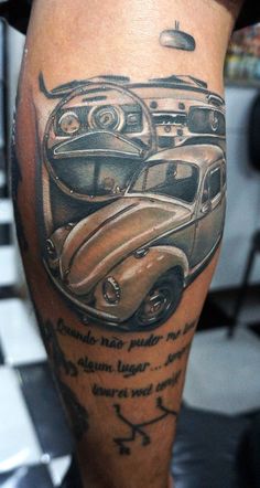 an old car tattoo on the leg