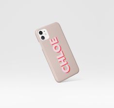 a pink phone case with the word choice printed on it, sitting in front of a white background