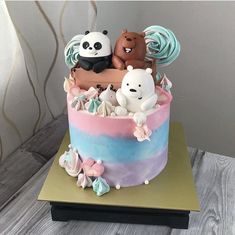 there is a cake decorated with animals on it