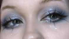 Blue Eyeshadow For Hooded Eyes, Silver Goth Makeup, Emo Prom Makeup, Blue Goth Makeup, Frostbite Makeup, Star Makeup Look, Dark Blue Makeup, Blue Glitter Eye Makeup, Shiny Eyeshadow