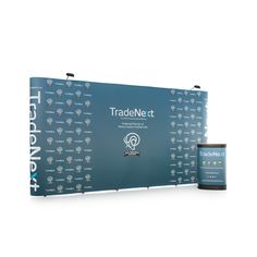 tradenext booth with blue backdrop and black canister on white background for tradenext