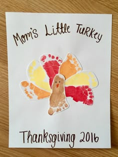 a turkey handprinted on a piece of paper with the words, mom's little turkey thanksgiving 2016