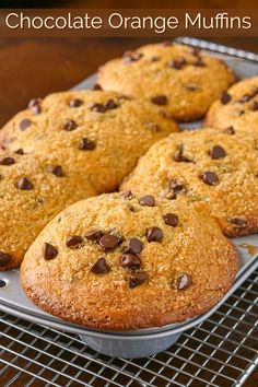 chocolate orange muffins on a cooling rack with the words, chocolate orange muffins