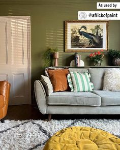 a living room with two couches and a rug on the floor in front of it