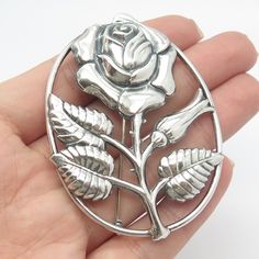 Great vintage condition.  925 Sterling Silver Vintage Danecraft Rose Floral Pin Brooch  Weight: 16.1g   WELCOME TO PAWN SHOP We are an actual pawn shop and have been in business for over 25 years. Since 1990, our establishment has been serving a variety of clients by providing them with short term cash solutions and options of liquidity regarding their treasured heirlooms. Acknowledging that today′s customers are very sophisticated and are looking for a variety of investments, our acquisitions a Floral Pins, Puffy Heart, Pawn Shop, Tattoo Inspo, Pin Brooch, Hand Picked, Trust God, Heart Design, 25 Years