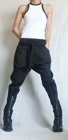 "Extravagant Women Harem Pants, Tight Zipper Pants, Women Baggy Trousers, Cyberpunk Trousers, Black Loose Pants, Gothic Pants ❤️ Extravagant designs and high quality fabrics! ❤️ Materials & Care Textile, Cotton Polyester Hand wash at low temperatures. Do not machine dry. Do not iron. Do not dry clean! ❤️ Sizing We can make your piece from XS to 5XL! Everything in the shop can be also made according to your measures free of charge! ❤️ Shipping ✈ Ready to ship The time I need to prepare an ord Zipper Pants Women, Black Loose Pants, Steampunk Shoes, Gothic Pants, Zipper Pants, Baggy Trousers, Steampunk Clothing, Edgy Style, Pantalon Large