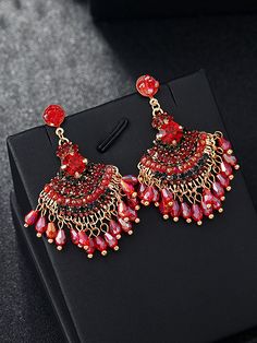 Add a touch of vintage charm to any outfit with these Women Vintage Crystal Tassel Fan Shape Earrings. Adorned with sparkling crystals, these elegant earrings will catch the light and draw attention to your face. Perfect for a night out or a special occasion, these earrings will elevate your style. Item Code: 7657861709886 Material: Bead.Alloy Pattern: Tassel Highlight: Plated Party. Daily.Vacation Gift.Traveling Crystal Tassel Drop Earrings As Gift, Crystal Tassel Drop Earrings For Gifts, Elegant Jeweled Beaded Earrings For Party, Jeweled Dangle Beaded Earrings For Party, Bohemian Jeweled Crystal Earrings For Party, Metal Crystal Earrings With Dangling Beads For Parties, Party Metal Crystal Earrings With Dangling Beads, Bridal Earrings With Dangling Beads For Party, Party Bridal Earrings With Dangling Beads