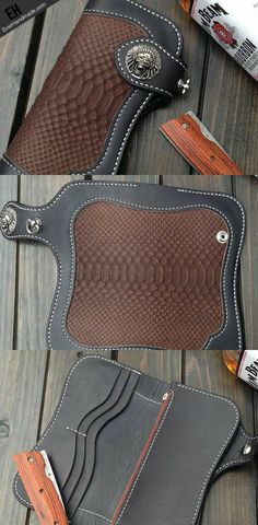 two brown and black leather cases sitting on top of a wooden table