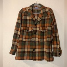 Vintage 1970’s Rare Pendleton Woolen Mills Portland, Or 100% Virgin Wool Sz Xl Brown, Green, Tan Plaid Shacket/ Over Coat Super Rare Vintage Over Coat/ Wool Plaid Jacket Made In The Usa Fabulous Christmas Gift For The Special Lady In Your Life! Tag Says Warranted To Be A Pendleton Trade Mark Reg.Us.Pat.Off. Size: Vintage Runs Small So This Will Likely Fit A Womens Xl Or Mens Large Better Can Be Worn Oversized By Any Smaller Size Too! Thick Warm Cozy Heavy Duty This Weights Quite A Few Lbs Materi Warm Tone Colors, Over Coat, Pendleton Jacket, Pendleton Woolen Mills, Plaid Shacket, Trade Mark, Fabulous Christmas, Tan Plaid, Plaid Jacket