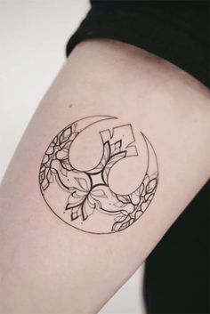 a woman's arm with a tattoo on it that has the number five in it