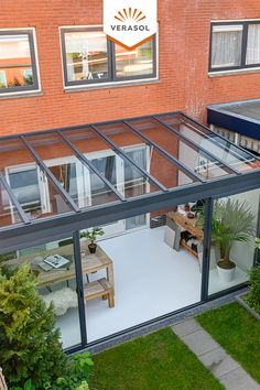 an overhead view of a glass house with the logo verasol on it's side