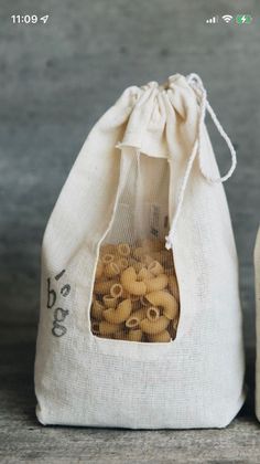 two bags filled with cookies sitting next to each other