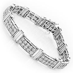 This Sterling Silver Diamond Bracelet weighs approximately 25 grams and showcases 0.60 carats of bezel-set round diamonds. Featuring a versatile design and a luxurious rhodium plating for extra shine, this men's diamond bracelet is an affordable genuine diamond jewelry piece. Luxury Men's Ring In Diamond White As A Gift, Silver Diamond Mens Watch, Luxury Men's Round Diamond Bracelet, Luxury Men's Sterling Silver Jubilee Bracelet, Mens Diamond Bracelet Jtv, Luxury Men's Diamond Bracelet, Cool Bracelets For Guys Diamond, Mens Sterling Silver Bracelets, Gents Bracelet