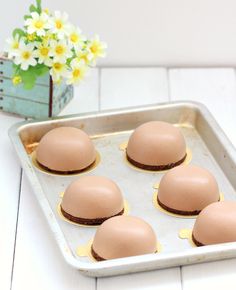 there are six eggs in the pan ready to be baked